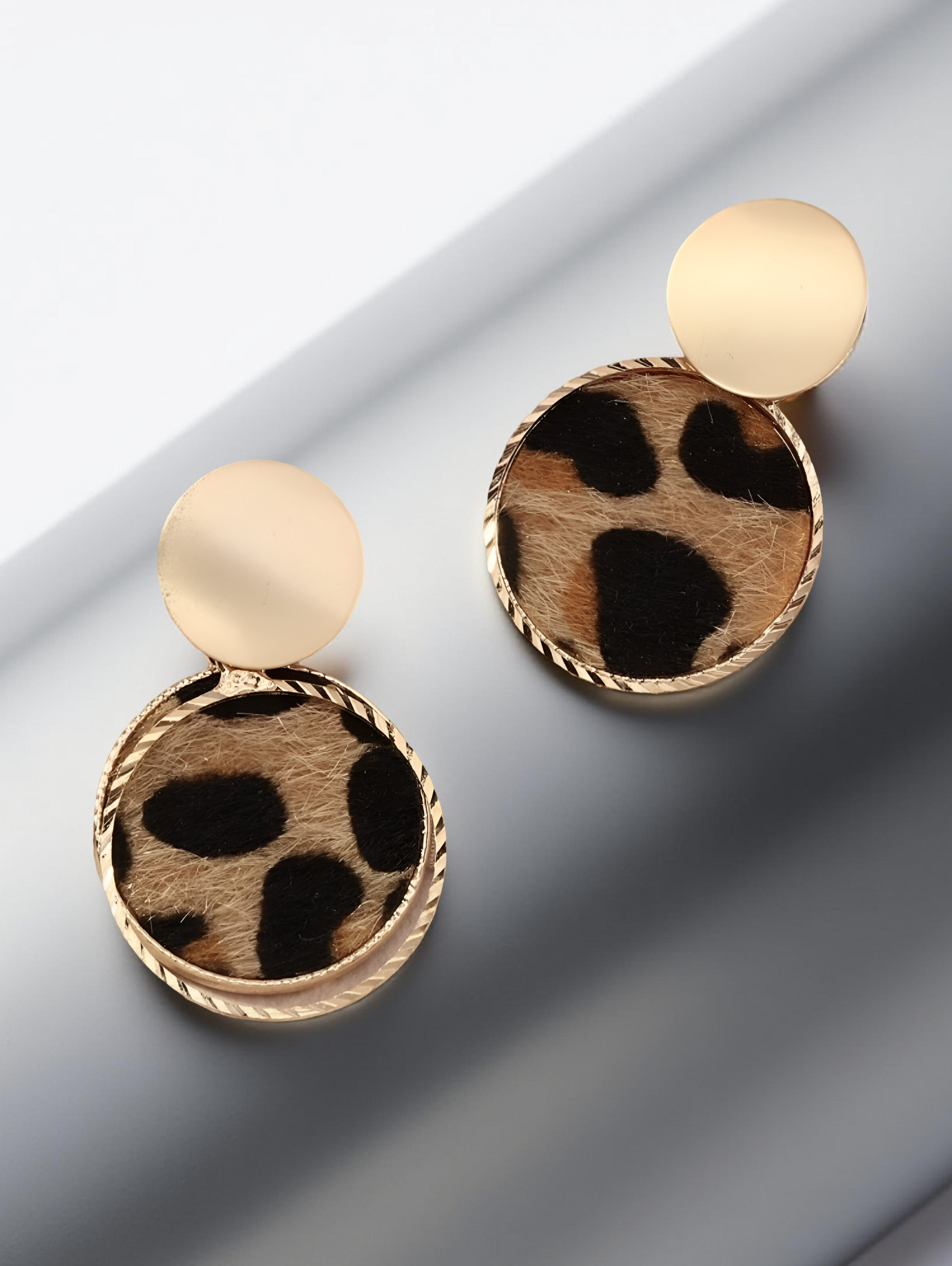 Stud earrings with Leopard accent